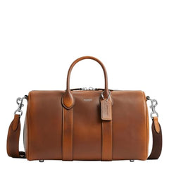 Coach Men's Compass 35 Bag – Saddle/Burnt Sienna – distressed leather, classic design, travel-friendly.