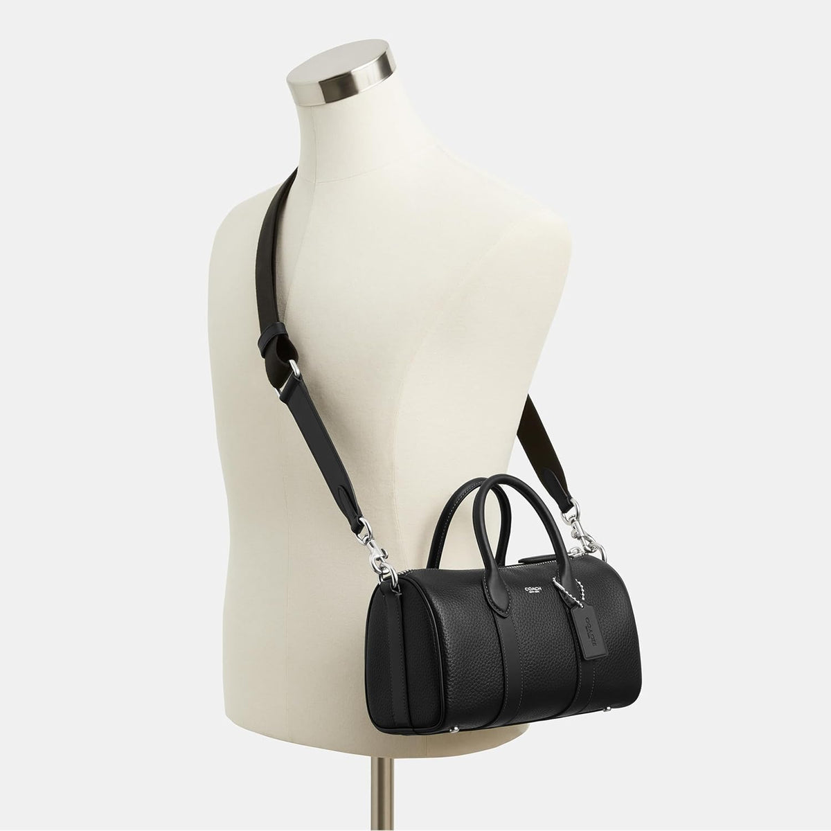 Coach Men's Compass Bag 25, premium leather travel bag with elegant leather trim and practical layout.